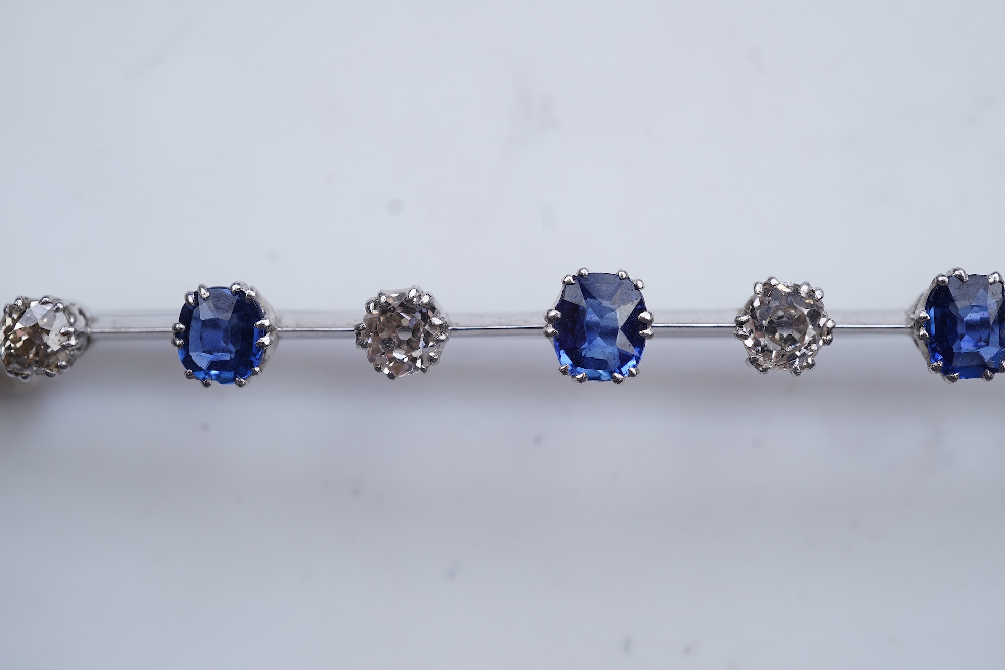 A diamond and sapphire bar brooch, early 20th century